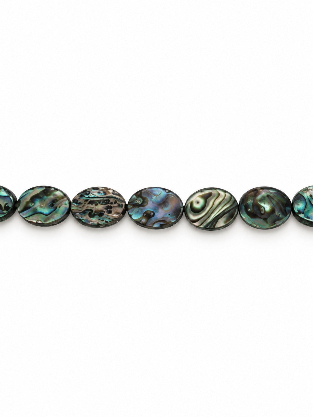 Abalone oval beads on white background