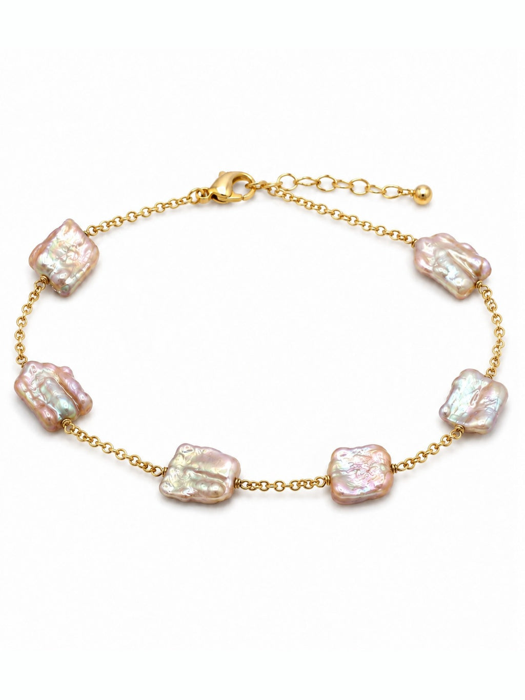 Baroque freshwater pearl bracelet on gold chain, white background