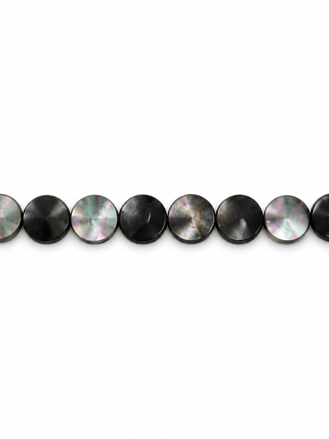 Black shell disc beads on white background