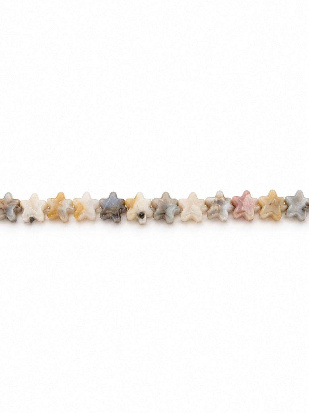 Crazy lace agate star beads on white background