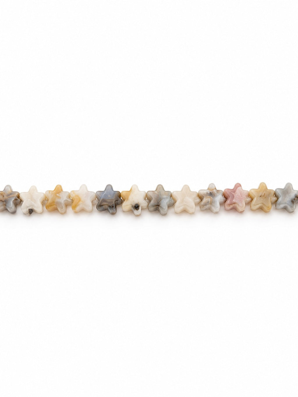 Crazy lace agate star beads on white background