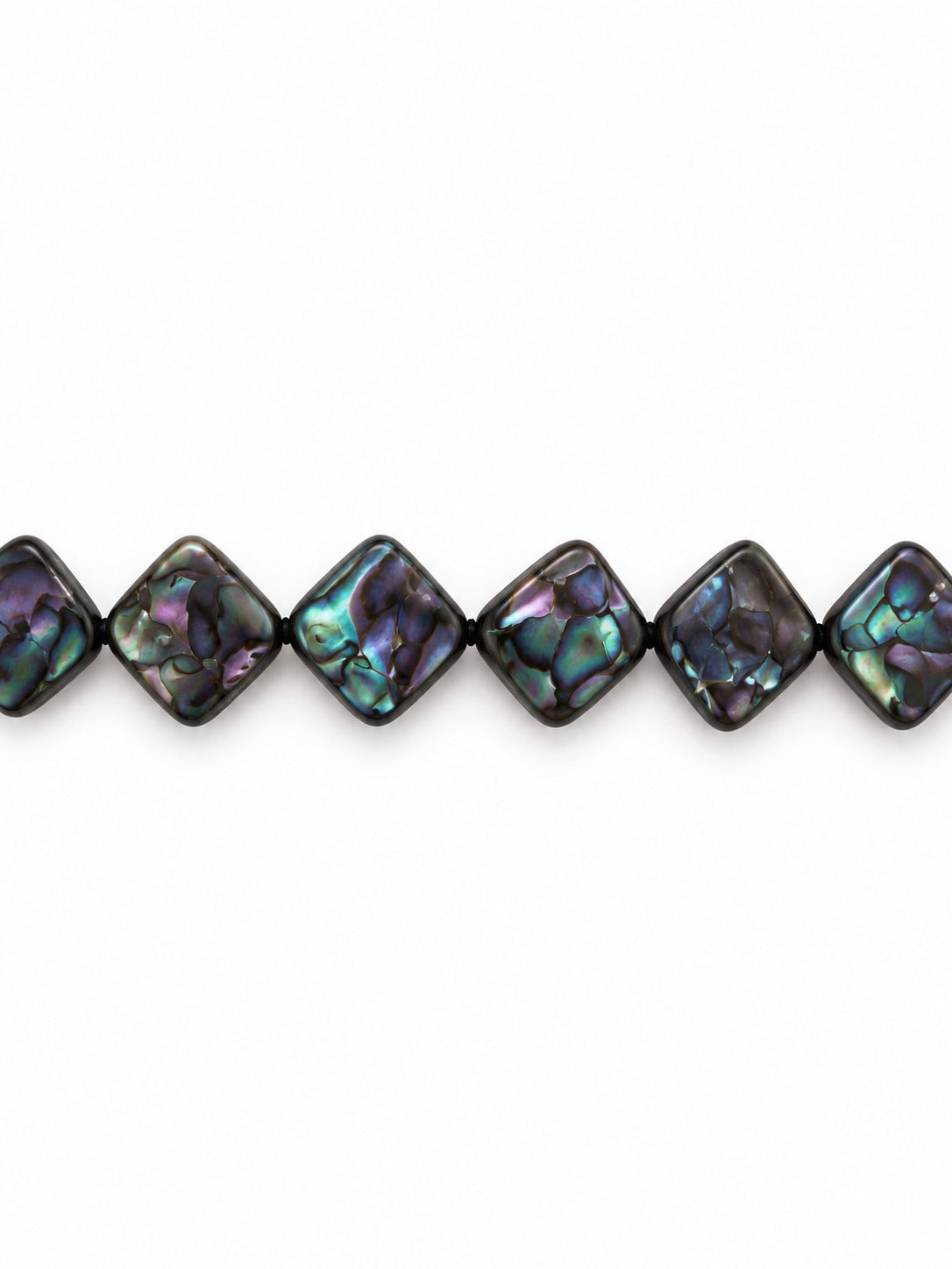 Freshwater pearl square beads on white background