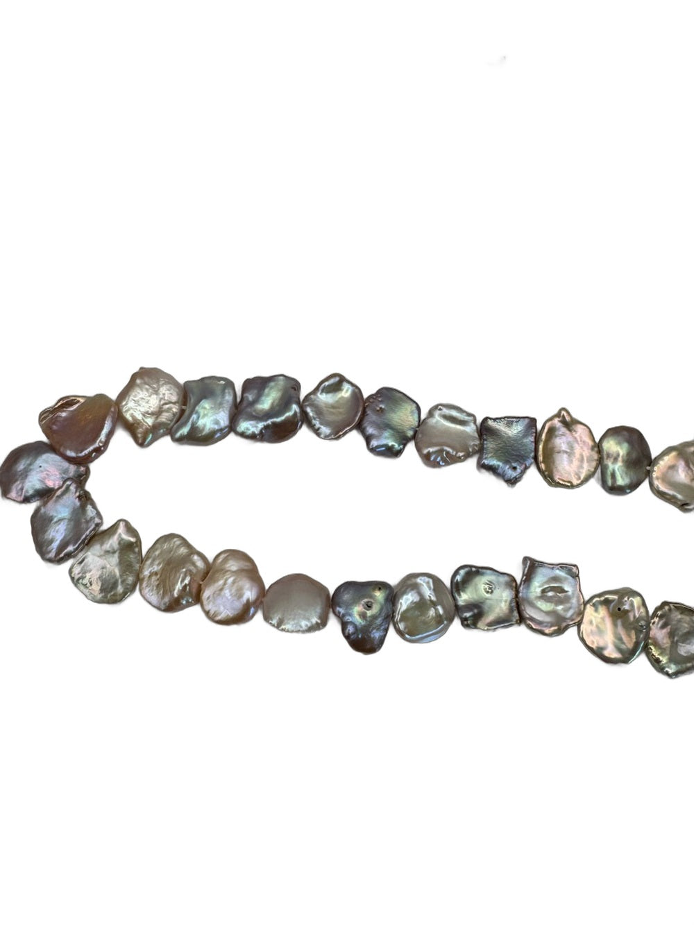 Keshi freshwater pearl strand on white