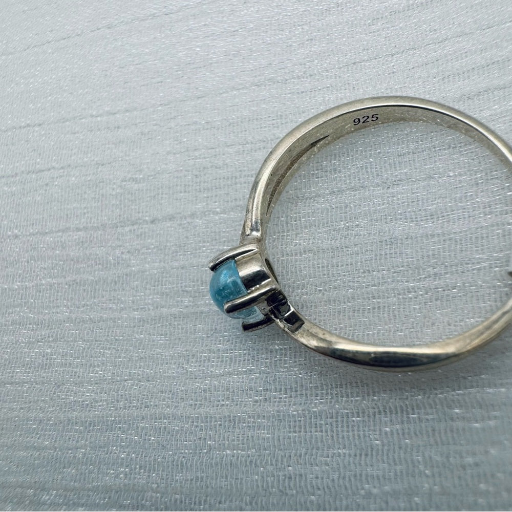 Oval Cabochon Swiss Blue Topaz Ring