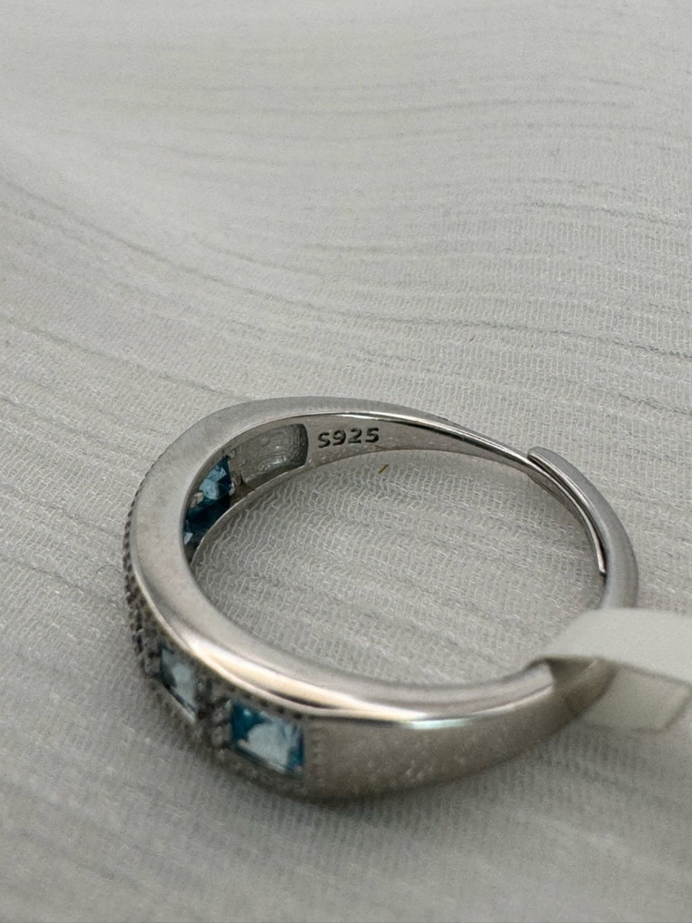 Blue Topaz Half Eternity Band