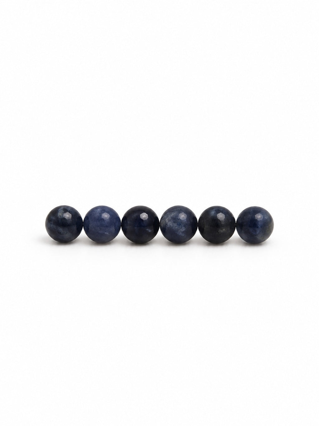 Sapphire round beads on white background