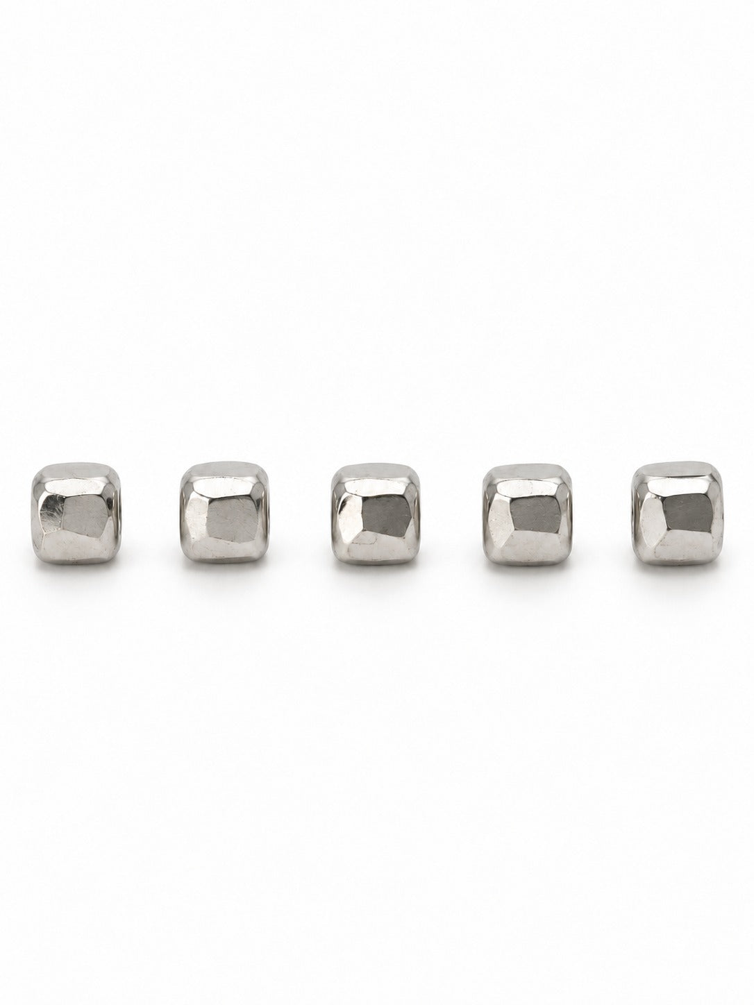 Silver faceted square beads on white background
