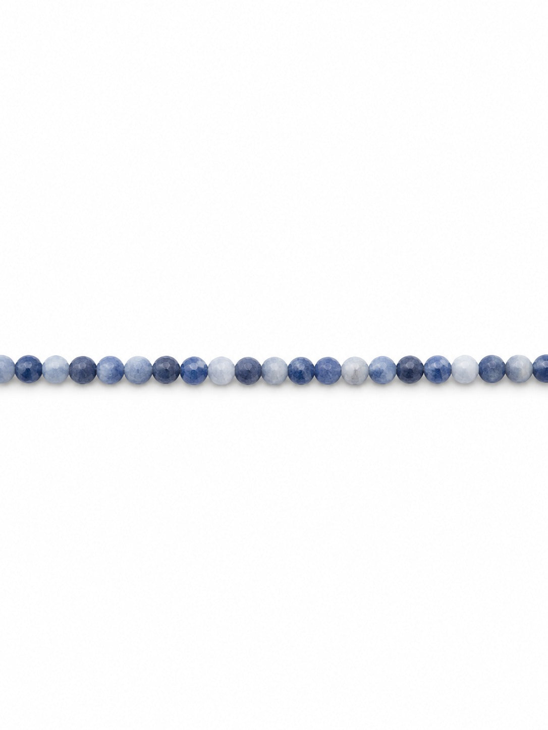 Sodalite micro faceted beads on white background